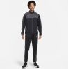 Nike Sportswear Sport Essentials Trainingspak van poly knit materiaal voor heren Groen online kopen